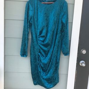 Crushed blue-green velvet body shaped dress.